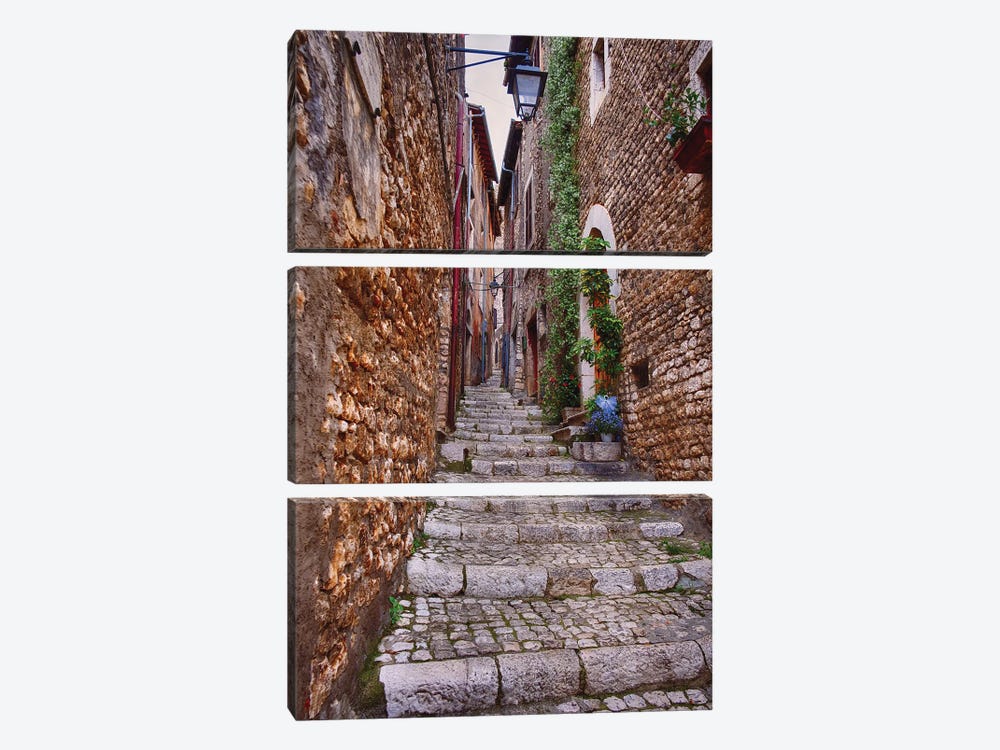 Narrow Cobblestone Alley In A Medieval Town With A Cheese Shop, Sermoneta, Latina, Italy by George Oze 3-piece Canvas Art Print