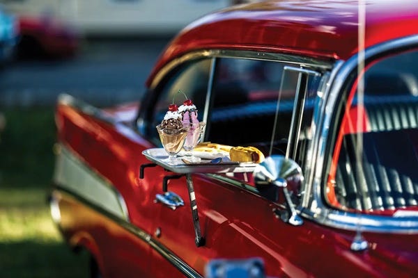 Ice Cream Sundaes And Hot Dogswith Fries In A Classic American Car Window