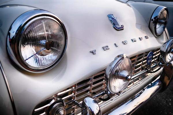 Close Up Frontal View Of A Vintage Triumph Tr3 Two Seater British Sports Car.