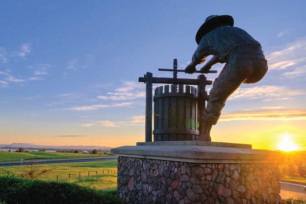 George Oze: The Grape Crusher Statue At Sunset, Napa Valley, California by George Oze