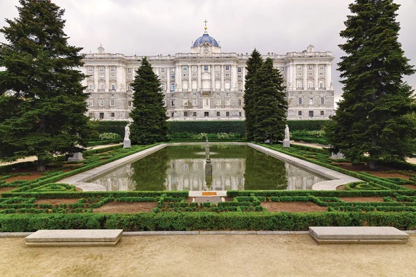 Community Of Madrid: Low Angle View Of A Palace From A Garden (Campo Del Moro), Madrid Royal Palace, Madrid, Spain by George Oze
