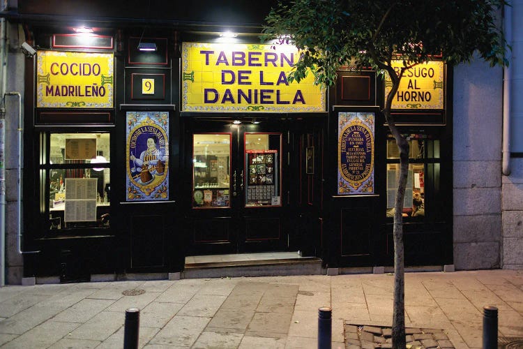 Entrance View Of A Tapas Bar At Night Taverna De La Daniela, Madrid, Spain