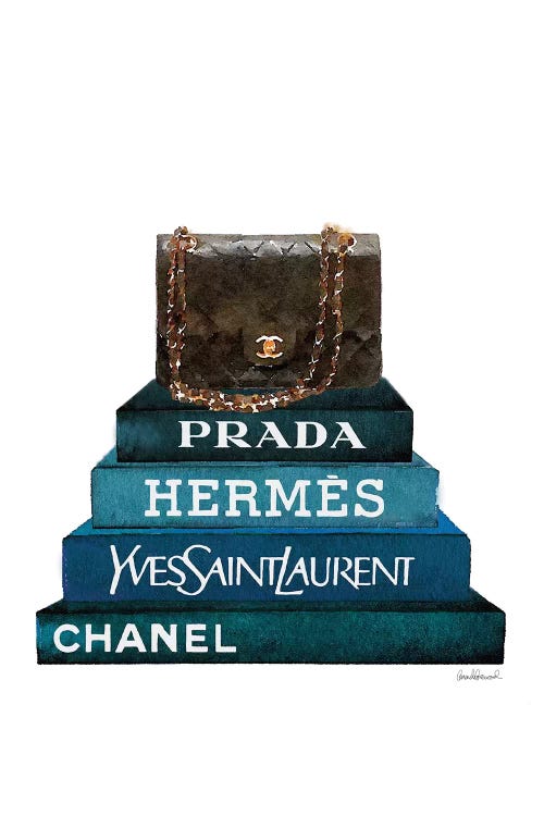 Stack Of Dark Teal And Black Fashion Books With A Chanel Bag