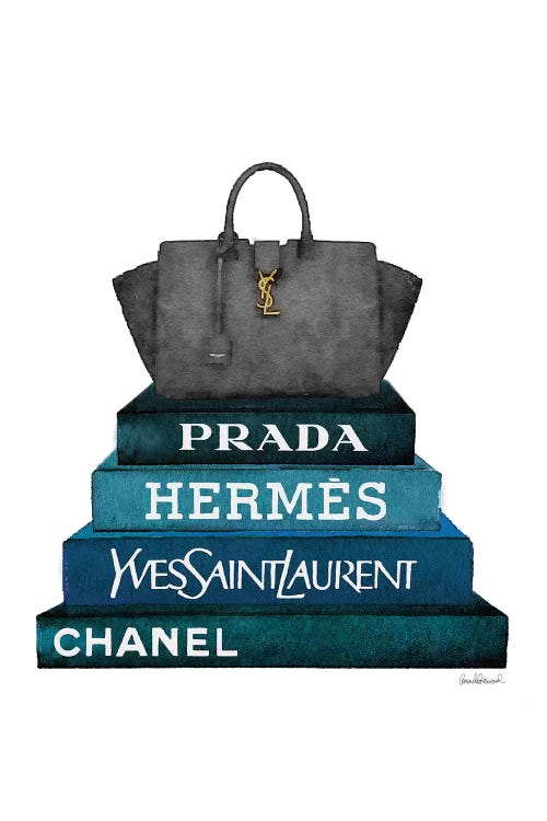 Stack Of Dark Teal And Black Fashion Books With A Yves St. Lauren Bag