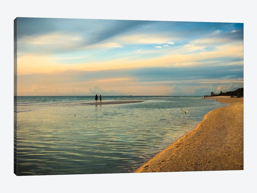 People standing on a sandbar in the water watching sunset by Sheila Haddad 1-piece Canvas Wall Art