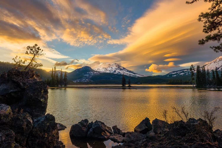 Sunset colors reflect off Diamond Lake from the lenticular clouds 