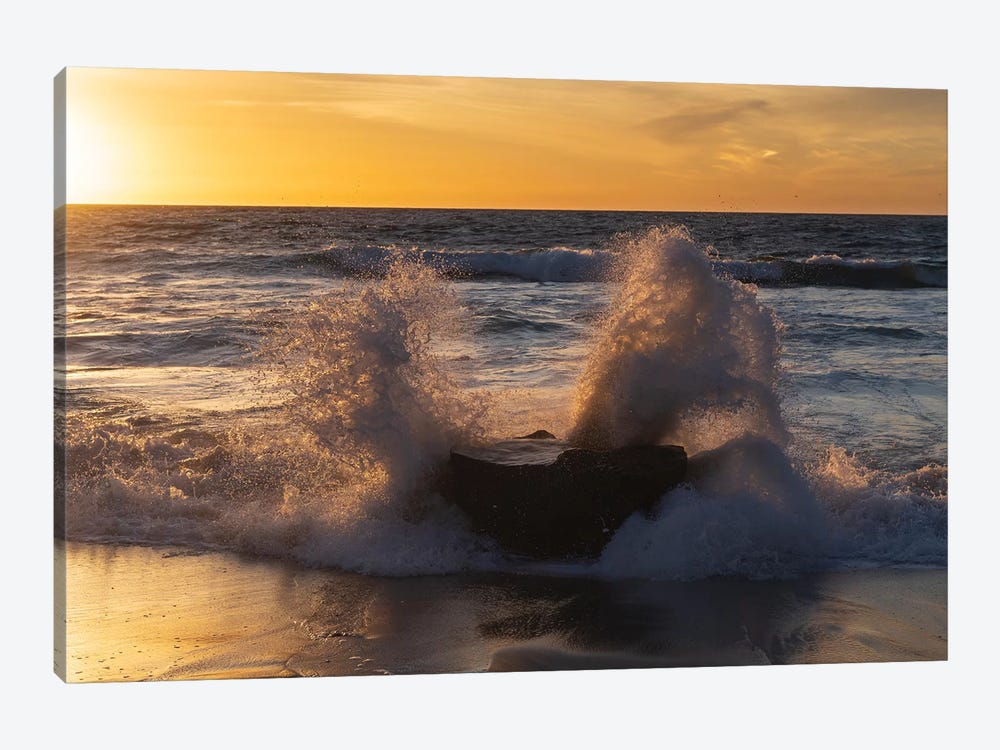 Golden sunset light coming through the white water crashing off a rock by Sheila Haddad 1-piece Canvas Art Print
