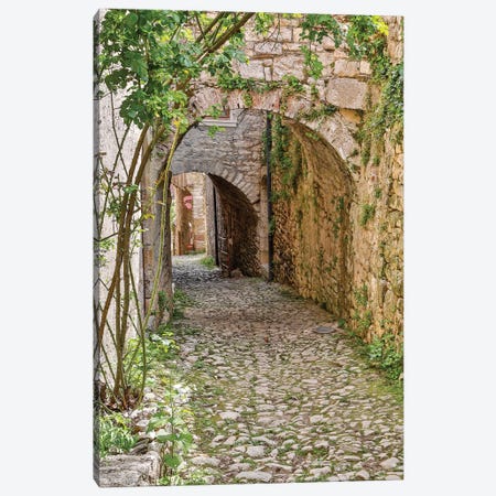 France, Saint-Cirq Lapopie. Tunneled walkway Canvas Print #HLO55} by Hollice Looney Canvas Print