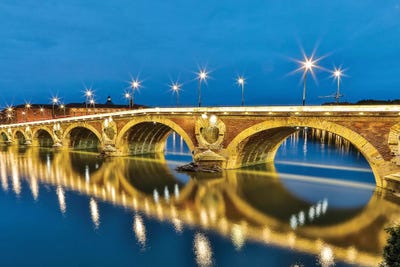 France, Toulouse. View of Pont Neuf and the Garonne River and reflections at sunset by Hollice Looney canvas print