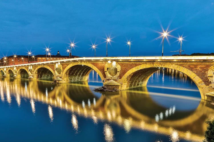 France, Toulouse. View of Pont Neuf and the Garonne River and reflections at sunset