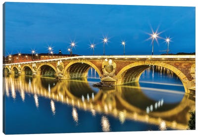 France, Toulouse. View of Pont Neuf and the Garonne River and reflections at sunset Canvas Art Print