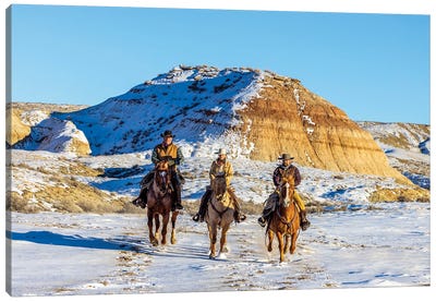 USA, Wyoming Hideout Horse Ranch, Wranglers And Horses In Snow Canvas Art Print