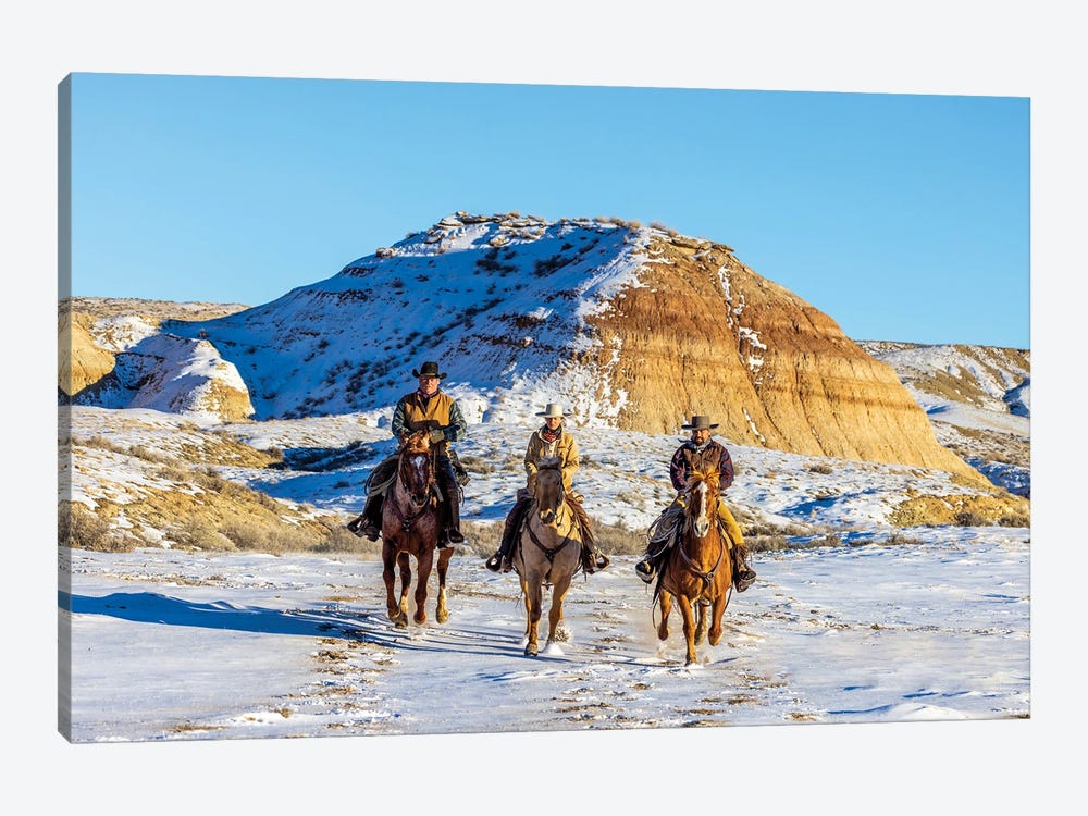 USA, Wyoming Hideout Horse Ranch, Wranglers And Horses In Snow by Hollice Looney 1-piece Canvas Print