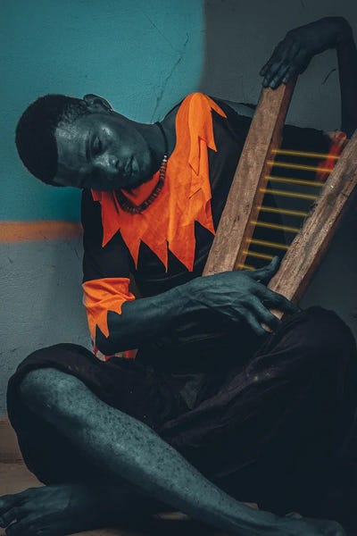 African Heritage: Haggard Harp Man by Harry Odunze