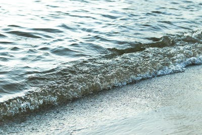 Waves Coming Onto Land by Henrike Schenk framed canvas print