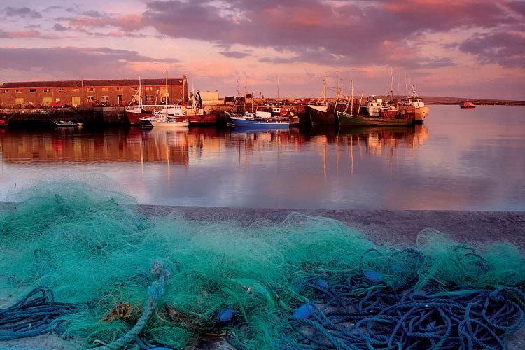 Kilronan Pier, Inishmore, Aran Islands, County Galway, Ireland; Docked Boats And Fishing Nets