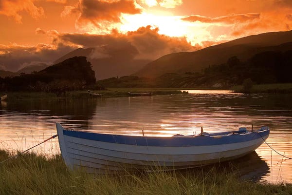 Lake Sunrises & Sunsets: Upper Lake, Killarney National Park, County Kerry, Ireland; Boat At Sunset by Irish Image Collection