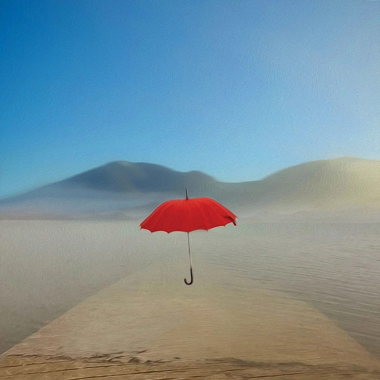 Red Umbrella Flying Over The Sea