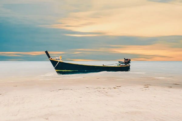 Ievgeniia Bidiuk: A Canoe On The Sandy Shore Of The Indian Ocean by Ievgeniia Bidiuk