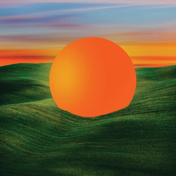 Ievgeniia Bidiuk: An Orange Ball On A Field Of Green Grass by Ievgeniia Bidiuk