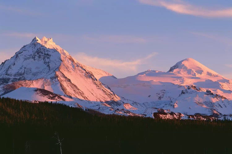 Oregon. Three Sisters Wilderness, sunset light on North and Middle Sister with autumn snow