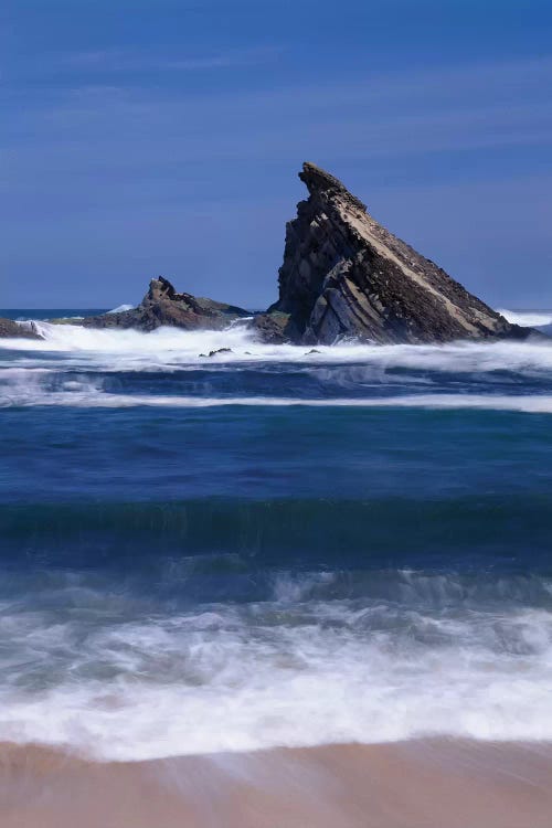 USA, Oregon, Shore Acres State Park. Incoming surf and tilted, sandstone sea stack.