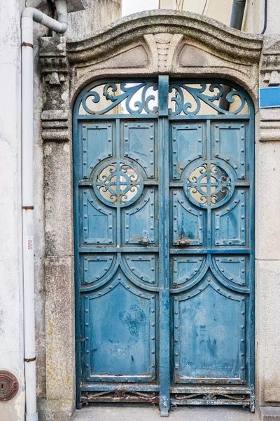 A Unique Metal Door On A Home In The Streets, Aveiro, Portugal by Julie Eggers framed wall art