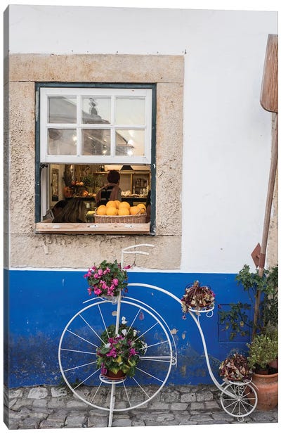 Cute Bicycle Planter In Front Of A Bakery In The Walled City, Obidos, Portugal Canvas Art Print - Portugal Art