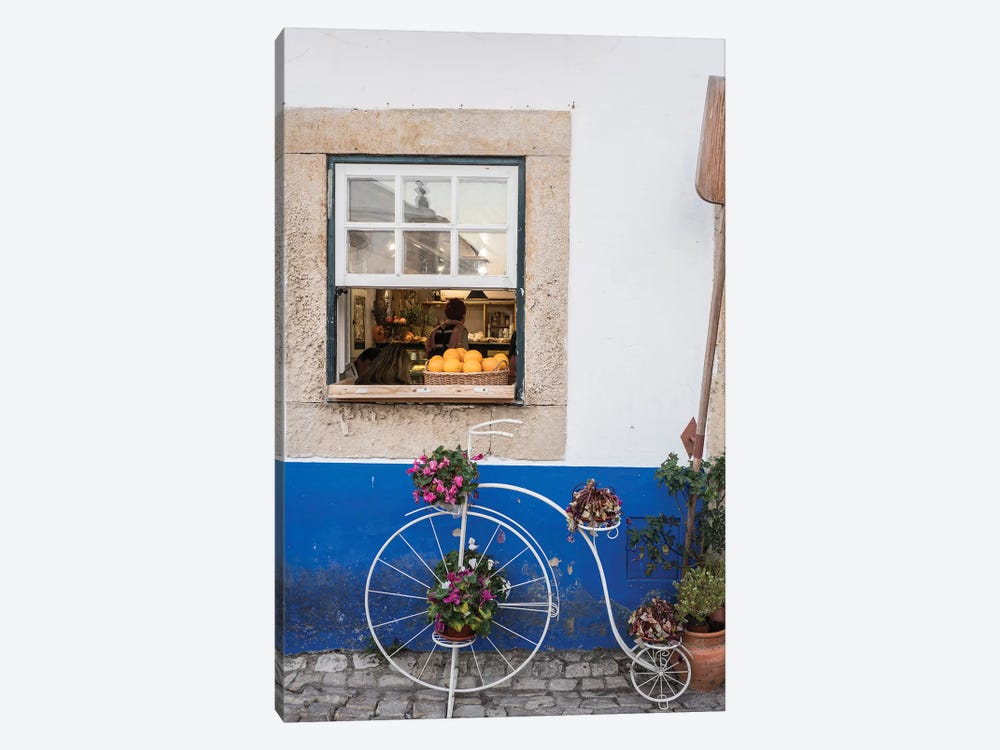 Cute Bicycle Planter In Front Of A Bakery In The Walled City, Obidos, Portugal by Julie Eggers 1-piece Canvas Art
