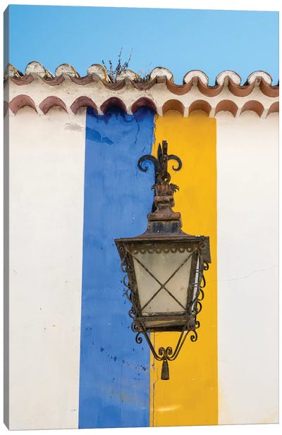 Wrought Iron Lantern Hanging From A Colorful Stripped Wall, Obidos, Portugal Canvas Art Print
