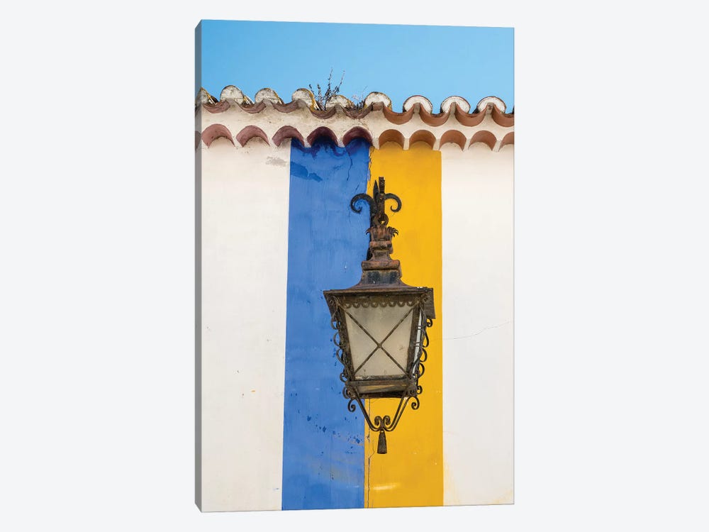 Wrought Iron Lantern Hanging From A Colorful Stripped Wall, Obidos, Portugal by Julie Eggers 1-piece Canvas Art Print