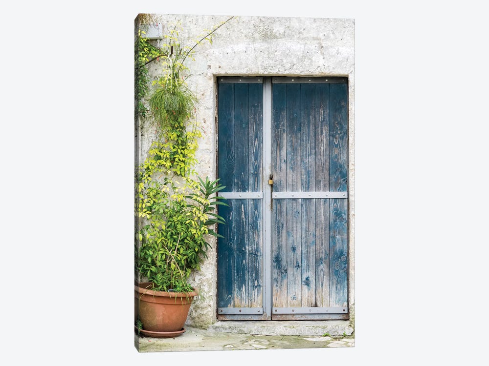 Blue Door On A Sassi House In Matera by Julie Eggers 1-piece Canvas Art Print