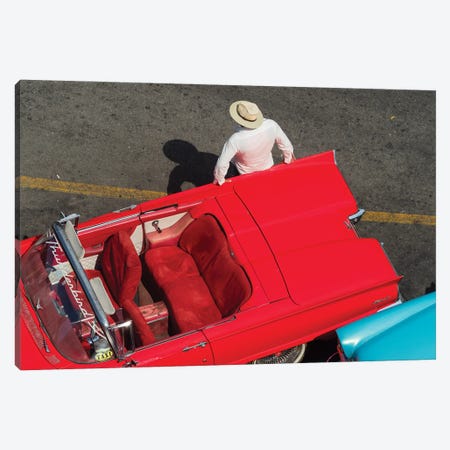 Cuba, Havana, Havana Vieja (Old Havana), red classic convertible and driver, viewed from above. Canvas Print #JLM8} by Merrill Images Canvas Artwork