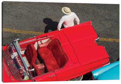 Cuba, Havana, Havana Vieja (Old Havana), red classic convertible and driver, viewed from above. Canvas Art Print