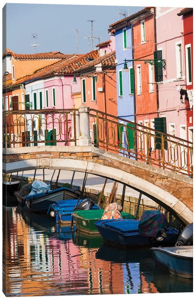 Italy, Burano. Reflection of colorful houses in canal. Canvas Art Print