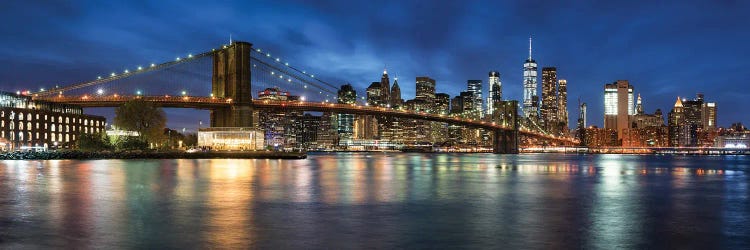 Manhattan Skyline Panorama With Brooklyn Bridge At Night