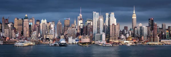 Manhattan: Panoramic View Of The Manhattan Skyline Along The Hudson River by Jan Becke