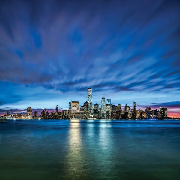 New York City Skylines: Manhattan Skyline At Night Seen From New Jersey by Jan Becke