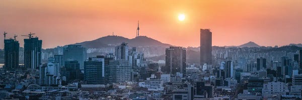 South Korea: Seoul Skyline Panorama At Sunset With View Of Namsan Mountain And N Seoul Tower by Jan Becke