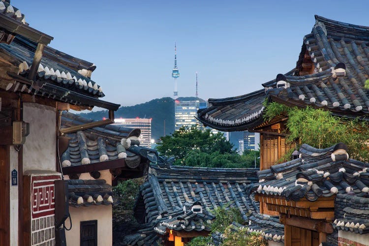 Historic Bukchon Hanok Village In Seoul With View Of The N Seoul Tower And Namsan Mountain At Night