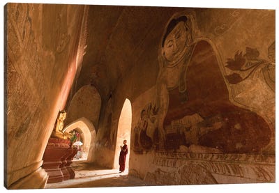 Young Novice Monk Praying To Buddha Inside An Old Temple In Bagan, Myanmar Canvas Art Print - Burma (Myanmar)