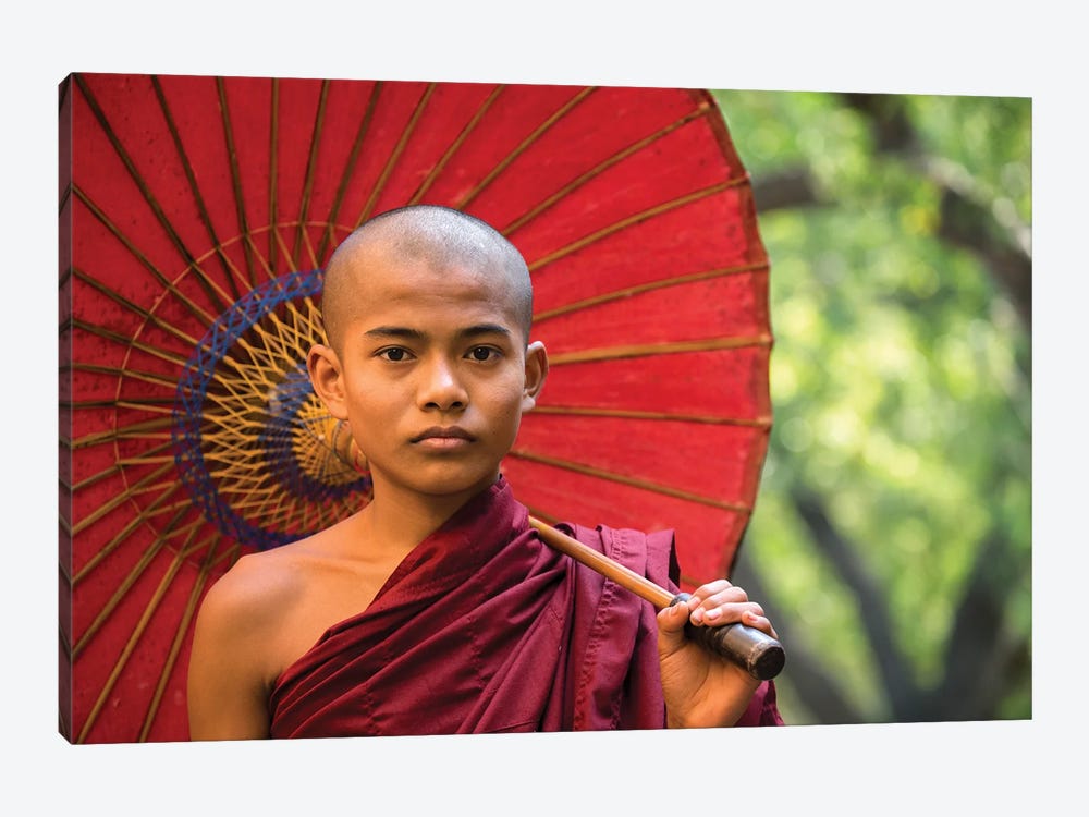Portrait Of A Young Buddhist Monk With Red Umbrella, Myanmar by Jan Becke 1-piece Canvas Art
