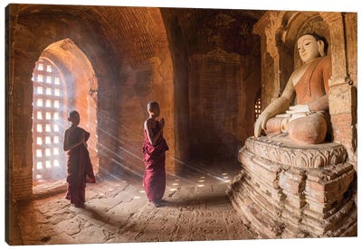 Two Young Novice Monks Praying To Buddha In An Old Temple In Bagan, Myanmar Canvas Art Print - Burma (Myanmar)