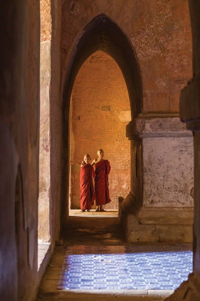 Buddhism: Two Young Novice Monks In An Old Temple, Bagan, Myanmar by Jan Becke