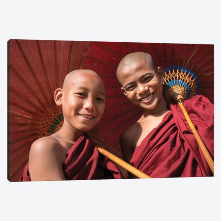 Two Young Buddhist Monks Smiling And Holding Red Umbrellas, Myanmar Canvas Print #JNB1149} by Jan Becke Art Print