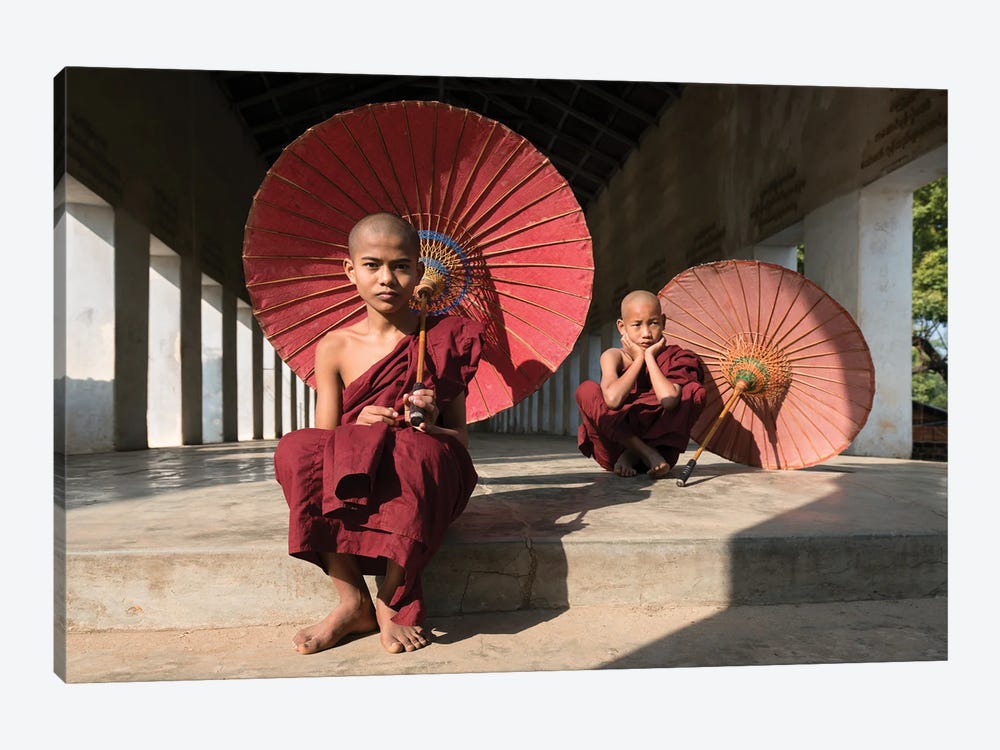 Young Buddhist Monks With Red Umbrellas, Bagan, Myanmar by Jan Becke 1-piece Canvas Art