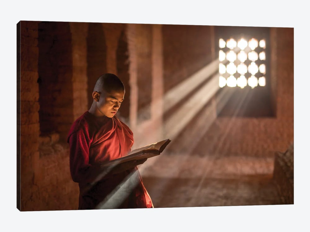 Burmese Monk Reading A Book In A Temple, Bagan, Myanmar by Jan Becke 1-piece Art Print