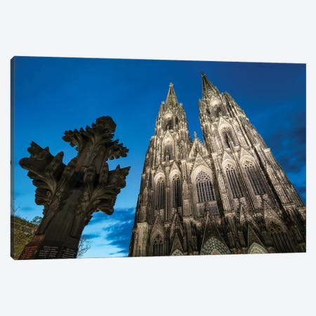 Kreuzblume In Front Of The Cologne Cathedral, North Rhine-Westphalia, Germany Canvas Print #JNB1218} by Jan Becke Canvas Art Print