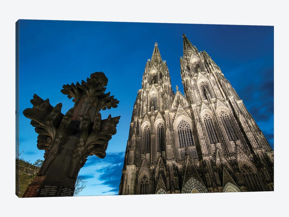 Kreuzblume In Front Of The Cologne Cathedral, North Rhine-Westphalia, Germany by Jan Becke 1-piece Canvas Wall Art