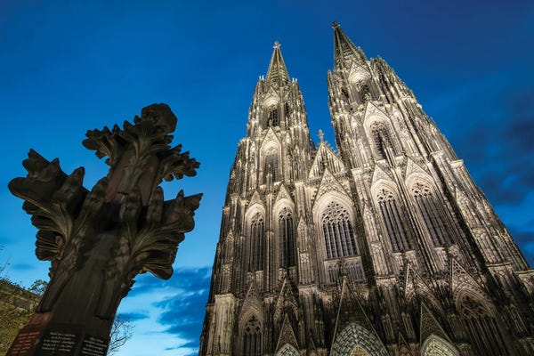 Cologne: Kreuzblume In Front Of The Cologne Cathedral, North Rhine-Westphalia, Germany by Jan Becke